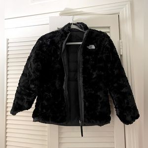 The North Face Girls Reversible puffer, furry jacket in black